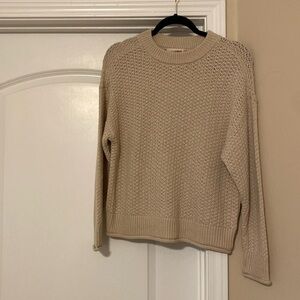 Beige knitted sweater